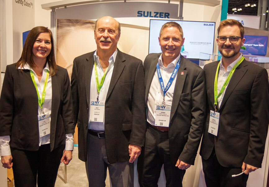 The folks at Sulzer Mixpac. (Photo: Jahmel Charles, Dental Tribune America)