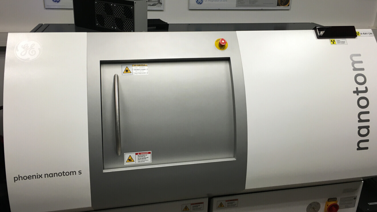 A tooth about o be inserted into a Nanotom scanner for radioisotope thermoelectric generator (RTG) scanning. 