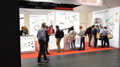 Garrison booth at IDS 2021. (Image: Dental Tribune International)