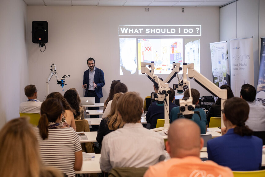 Dr Zaher Altaqi discussing a minimally invasive approach to removal of fractured files.