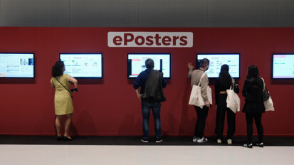 Participants engage with ePosters showcasing new clinical and scientific research in implant dentistry.