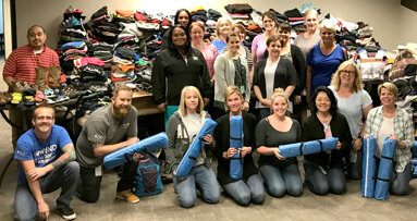 Dentsply Sirona Endodontics employees prepare to deliver donations to Youth Services Tulsa