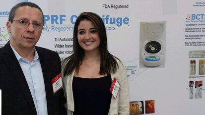 Dr. Alvaro Bentacur, left, and Michelle Hernandez of Boca Dental Supply.