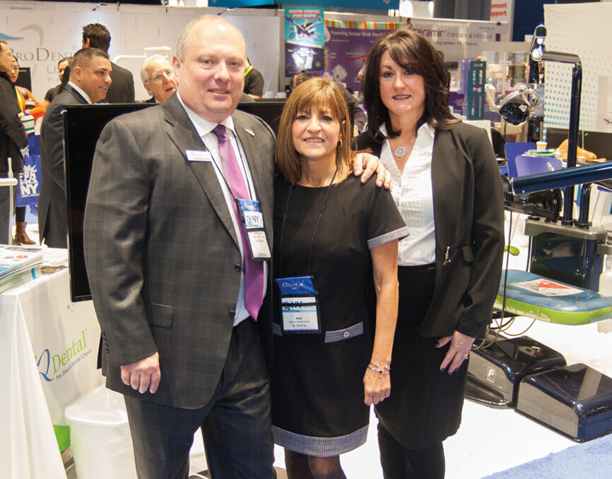 From left: Sergey, Ann and Tracy of IQ Dental. (Photo: Jahmel Charles, Dental Tribune America)