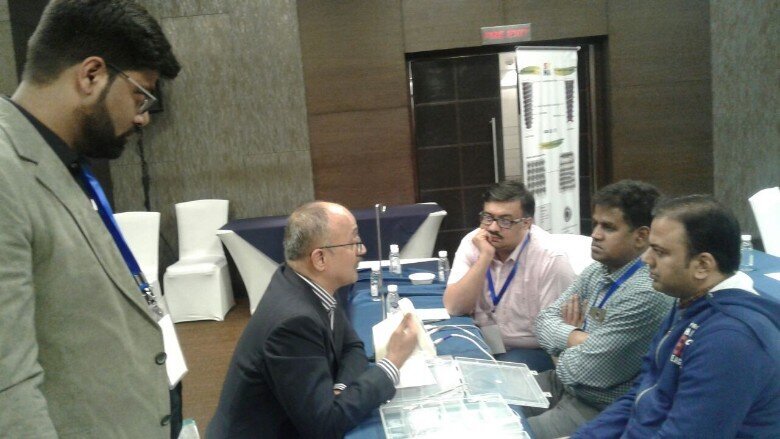 Dr.Paresh Kale (left) conducts a hands on workshop on tilted implants concept