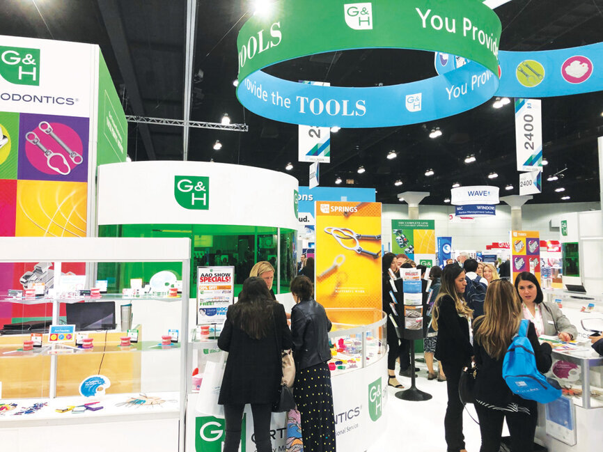 Attendees keep things busy at the G&H booth.