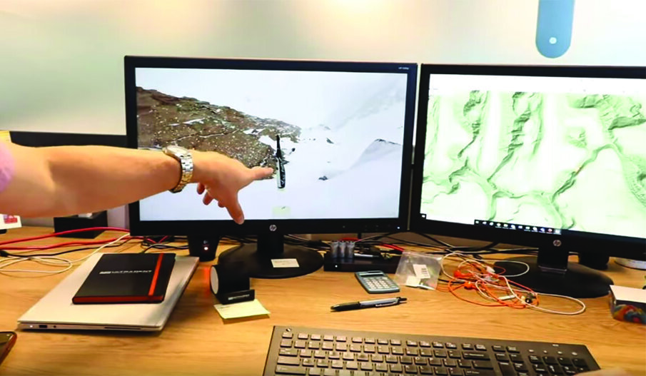 The team analyzing footage of the VALO Grand curing light detaching from the payload.