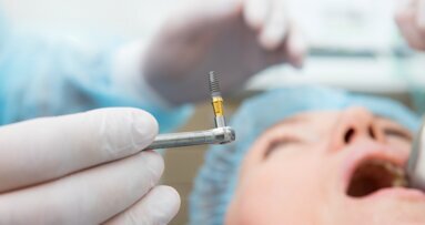 Simplifying implant planning and placement in the completely edentulous arch with in-office guide fabrication