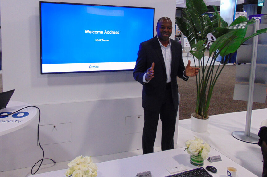 Matt Turner, president of Ormco Corp., speaks to members of the industry press during a news conference.