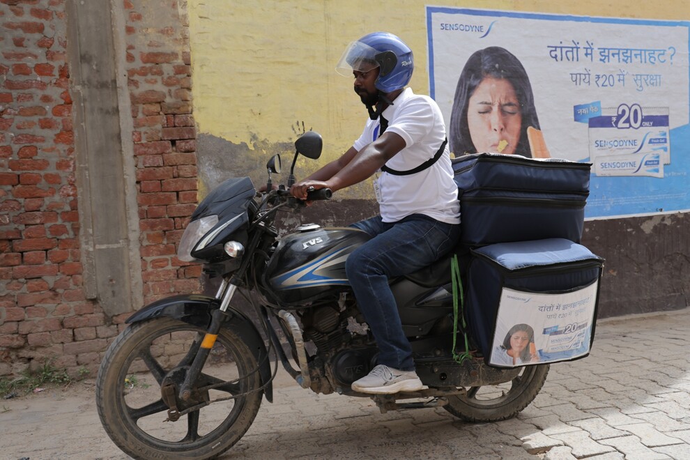 Haleon uses motorbike-based outreach teams in India to raise awareness of dentine hypersensitivity and improve access to oral health products in rural communities. (Image: Haleon)
