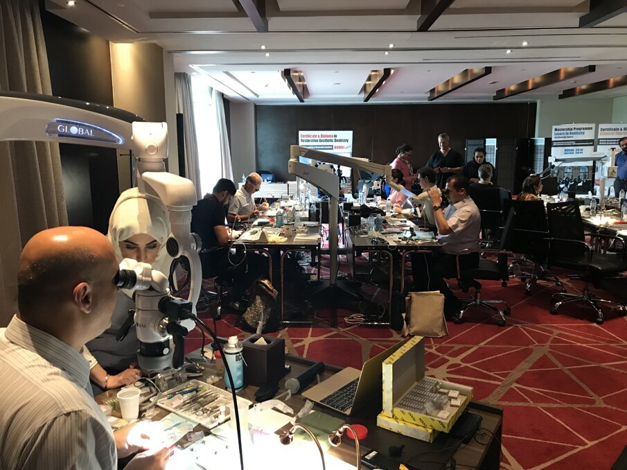 Dr. Antonis Chaniotis performing demonstration on non-surgical retreatment