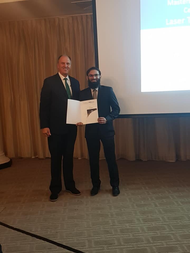 Dr Adil receiving his Certificate from Prof. Gutknecht during the graduation ceremony