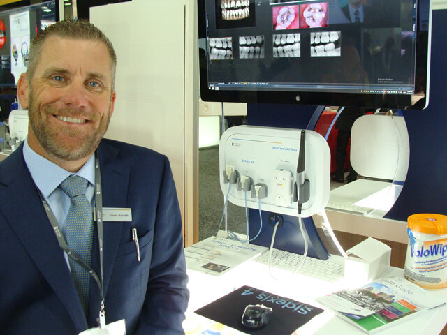 Trevor Barnett of Dentsply Sirona, with the company’s Schick 33 sensors.