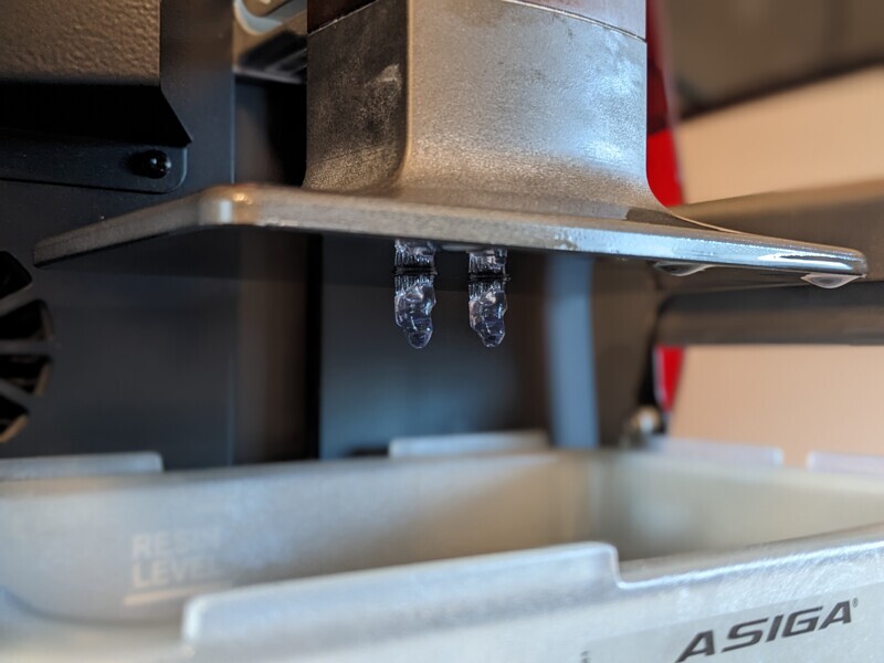Fig. 8: Printing the temporary abutments out of KeySplint Hard on the MAX UV using the UltraGLOSS material tray.