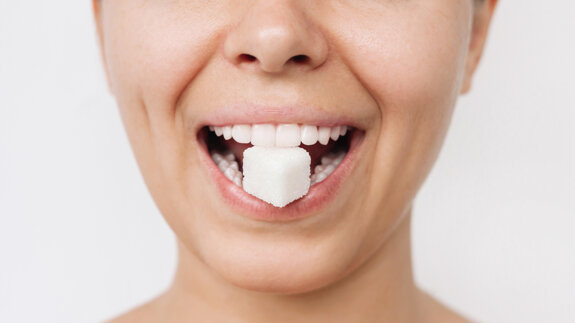 Type 2 diabetes may increase salivary sugars, shifting oral biofilms toward caries