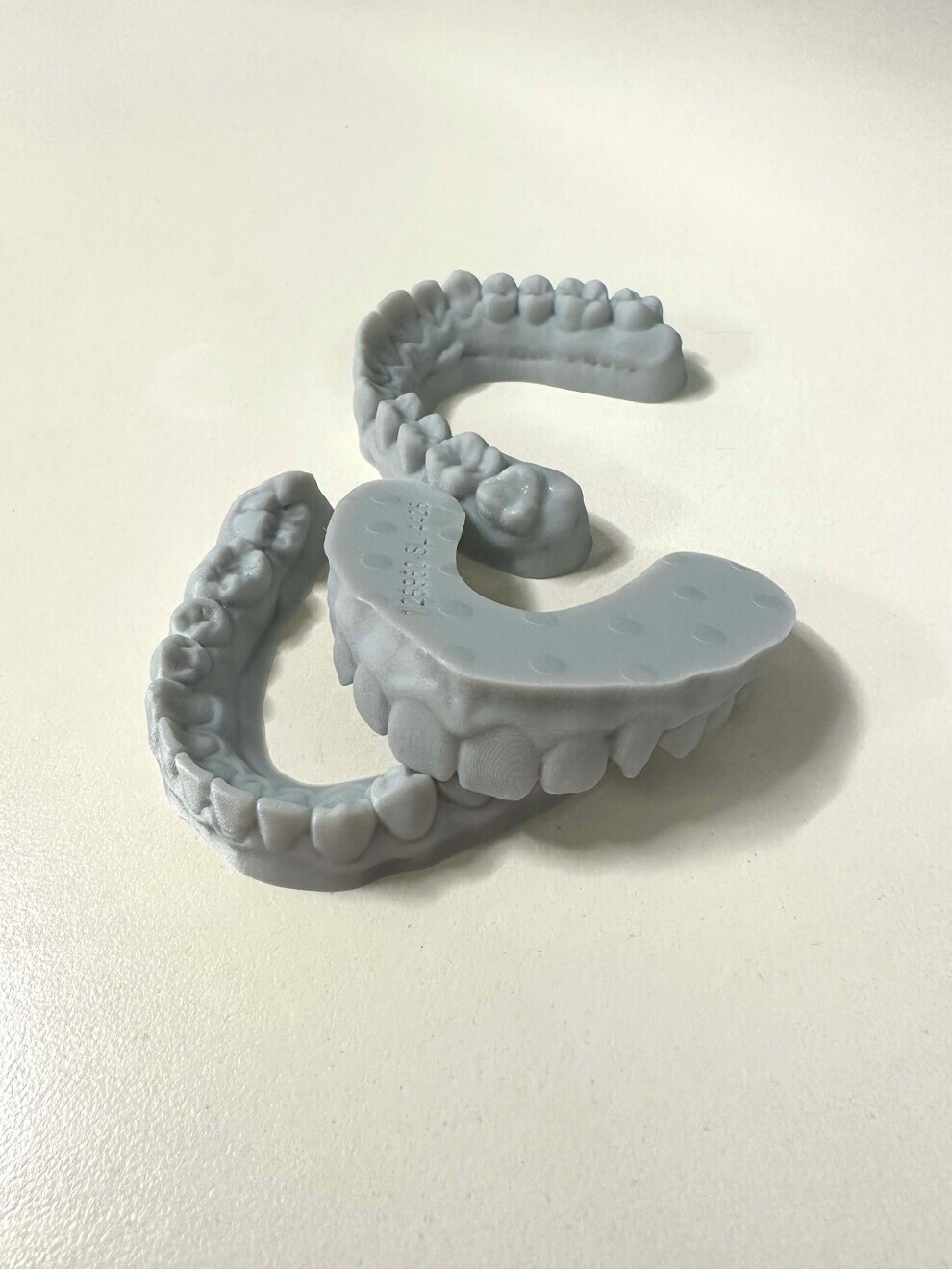 Fig. 5: Twenty-four-hour Essix solution models printed on the HeyGears UltraCraft A3D printer.