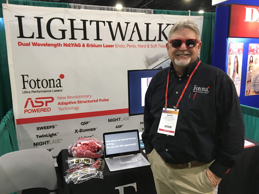 David Williams hands out cool shades in the Fotona/Lasers4Dentistry booth.