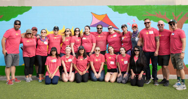 Volunteers build a playground and provide free dental care to children