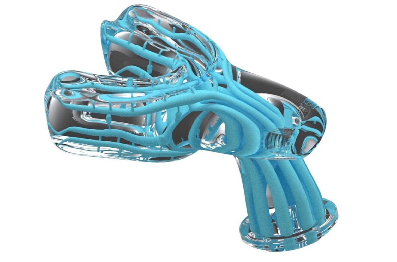 Fig. 3: Sample custom-fit mouthpiece, showing the path of the water.