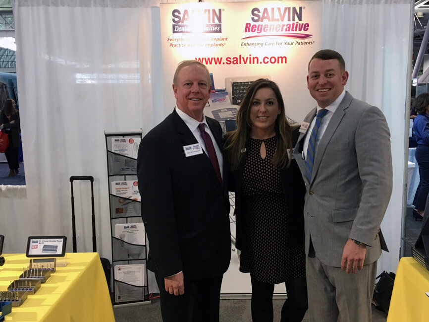 The staff of Salvin stand ready to greet meeting attendees with information and to answer questions.