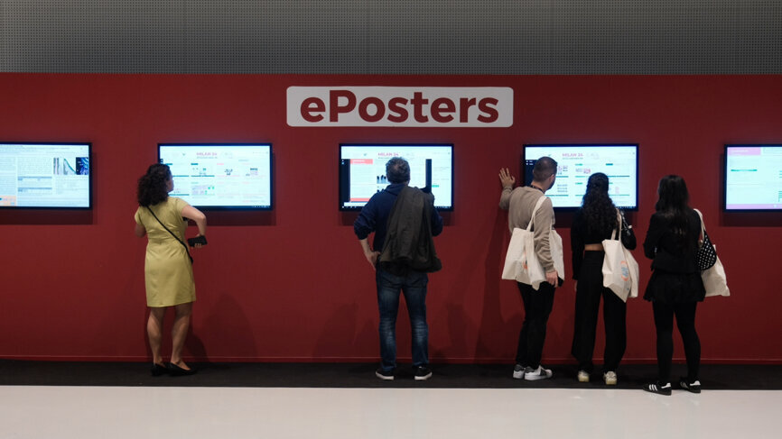 Participants engage with ePosters showcasing new clinical and scientific research in implant dentistry.