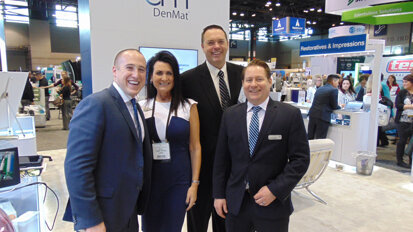 The reps from DenMat have plenty to smile about. From left: Ryan Weppler, Doreen Schillinger, Mack Bradley and Jason Dempsey. (Photo: Fred Michmershuizen/Dental Tribune America)