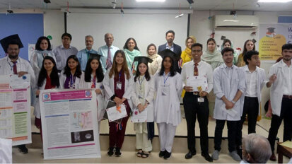HITEC-IMS teams on victory stand at poster, quiz contests