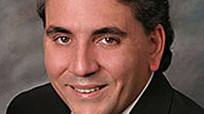 Caplanis is elected president of AAID Caplanis is elected president of AAID