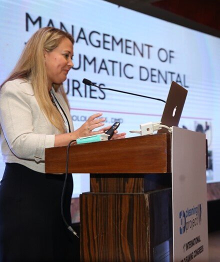 Dr. Daniela Bololoi lectures during the conference