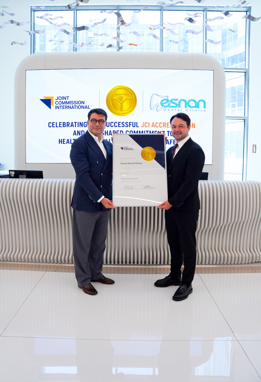During a ceremony at Esnan’s headquarters, Murat Küçükkaya, vice-president of international business development and partnerships at Joint Commission International (left), presented the accreditation certificate to Dr Serdar Yenigün, CEO and vice-chairman of the board of Esnan Dental Clinics.