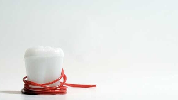 Survey: Tooth fairy is tightening her purse strings