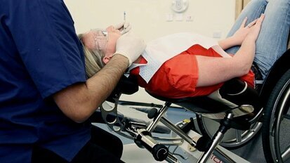 Dental chair simplifies treatment of physically handicapped