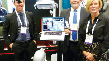 The group from ClaroNav stands ready to give a hands-on demonstration of the newest software from Navident. (Photo: Sierra Rendon/DTA)