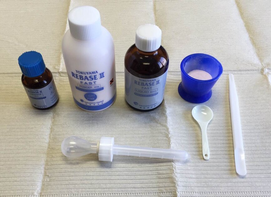 Fig. 18: Chairside hard denture relining material TOKUYAMA REBASE II.