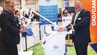 Benco’s Dan Cook and Todd Faulkner stand ready to demonstrate the many benefits of the Solea laser.