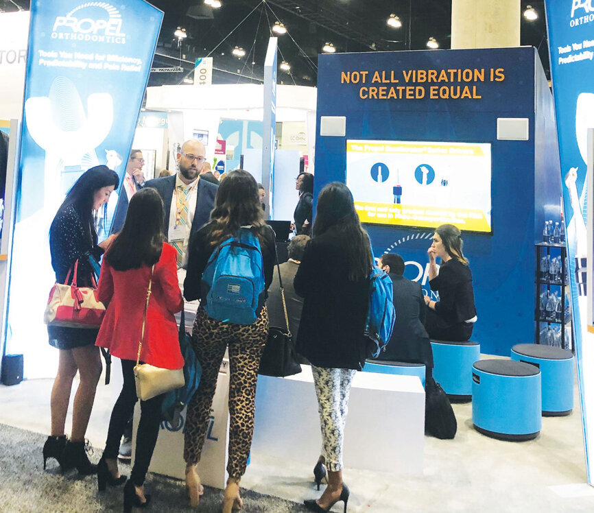 Patrick Toal, territory manager for PROPEL Orthodontics, introduces attendees to the company’s devices.