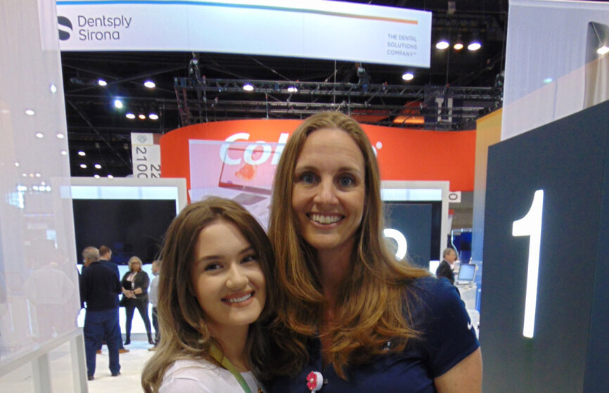 Amy Lusk, left, and Sarah Jockin, DDS, of Dentsply Sirona. (Photo: Fred Michmershuizen/Dental Tribune America)