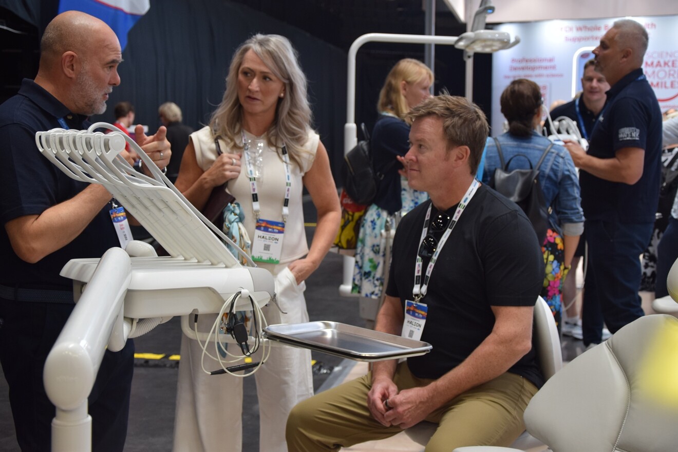 A-dec team members are on hand in Prague to discuss the company’s delivery systems and answer visitors’ questions.
