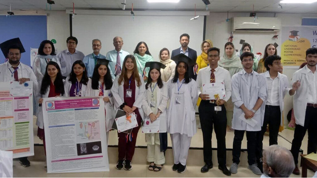 HITEC-IMS teams on victory stand at poster, quiz contests