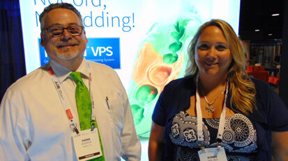 Hank Buddrus, left, and Aimee Vail, RDH, of Centrix.