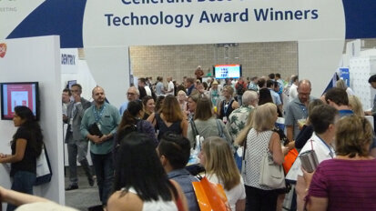 Attendees head in to the Cellerant Best of Class Technology Award Winners section of the exhibit hall. (Photo: Robert Selleck/DTA)