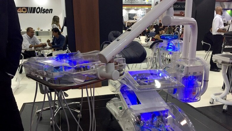 A transparent dental chair by Olsen, showing the high-quality parts used to build the company’s chairs.