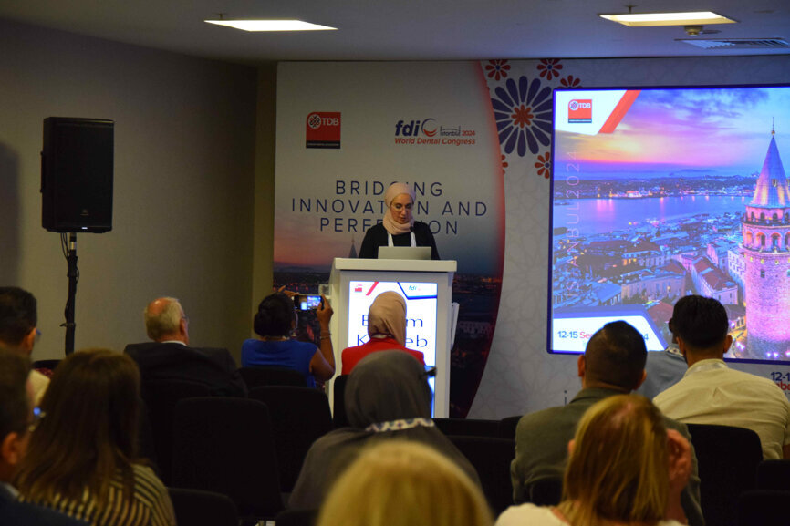 Dr Elham Talib Kateeb leads a session on refugee oral health. (Image: DTI)