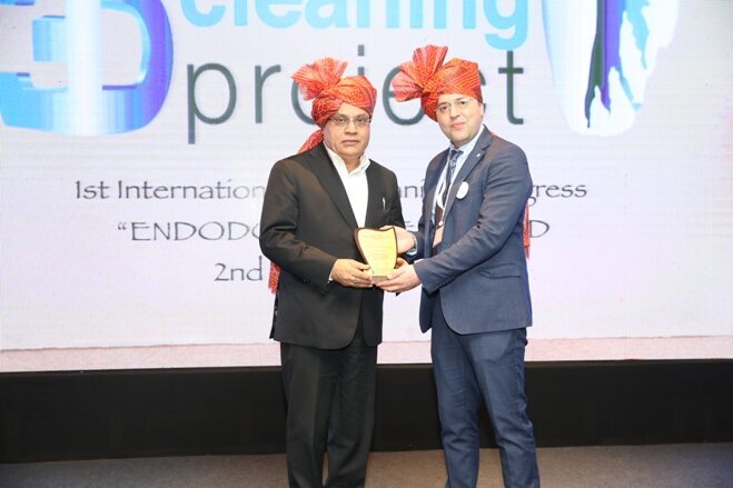 Dr. Anil Kohli felicitated by Dr Alfredo