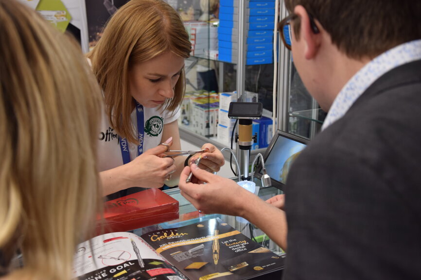 Participants at the CERKAMED booth, the silver sponsor of ROOTS SUMMIT 2022. 