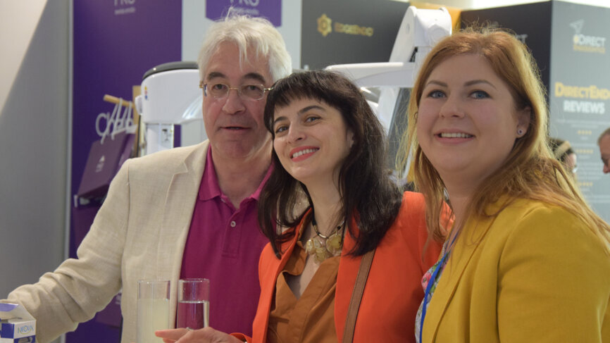 Attendees mingling with industry experts.