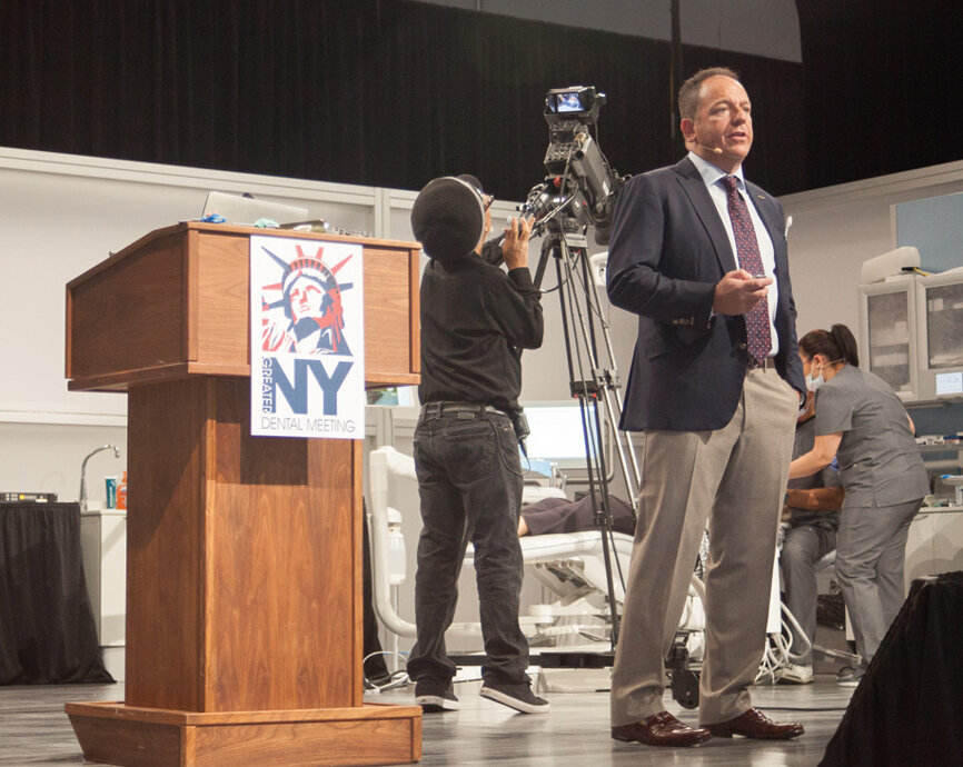 Dr. Ron Kaminer offers a presentation on ‘State of the Art Restorative Dentistry’ in the live dentistry arena. Dr. Lou Graham was co-presenter. (Photo: Jahmel Charles, Dental Tribune America)