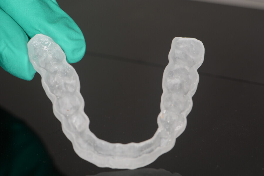Fig. 12: Flexible printed occlusal guard made from V-Print splint comfort (VOCO).