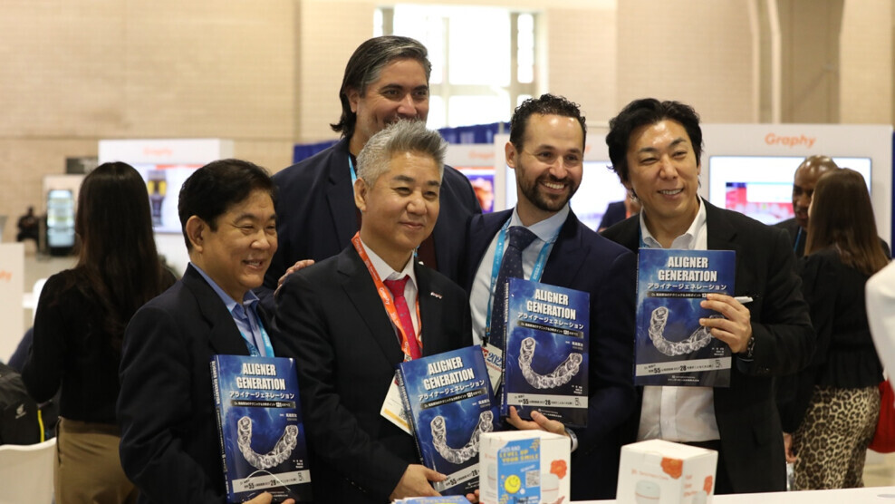 A book launch and autograph session with Dr Kenji Ojima (right), expert in advanced aligner orthodontics, were hosted at the Graphy booth.