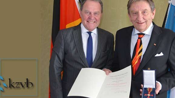 Dr. Janusz Rat erhält Bundesverdienstkreuz